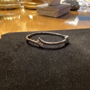 Silvertone Hinged Knife-Edge Bangle Bracelet with CZ Stones